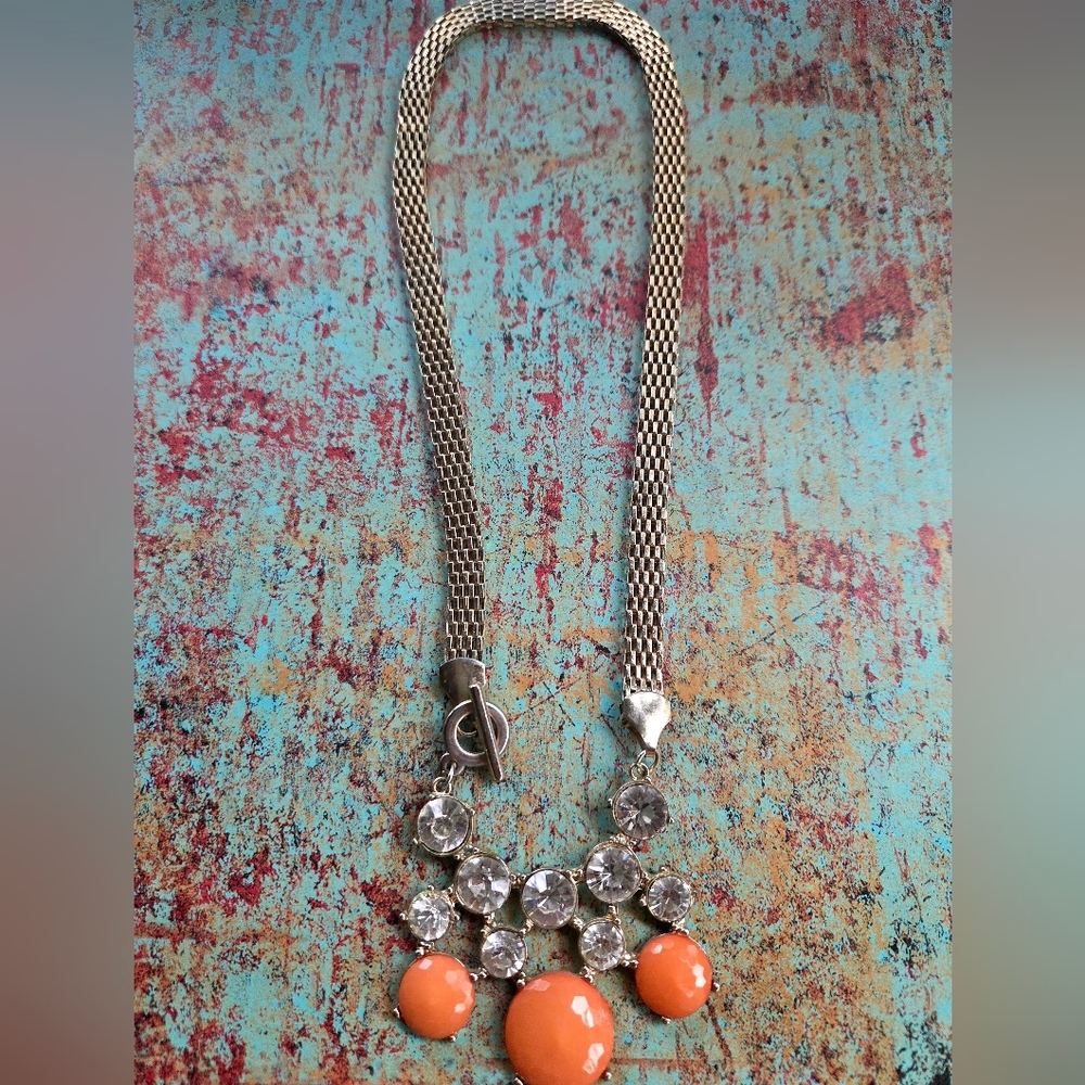 Elegant Gold and Peach Colored Necklace